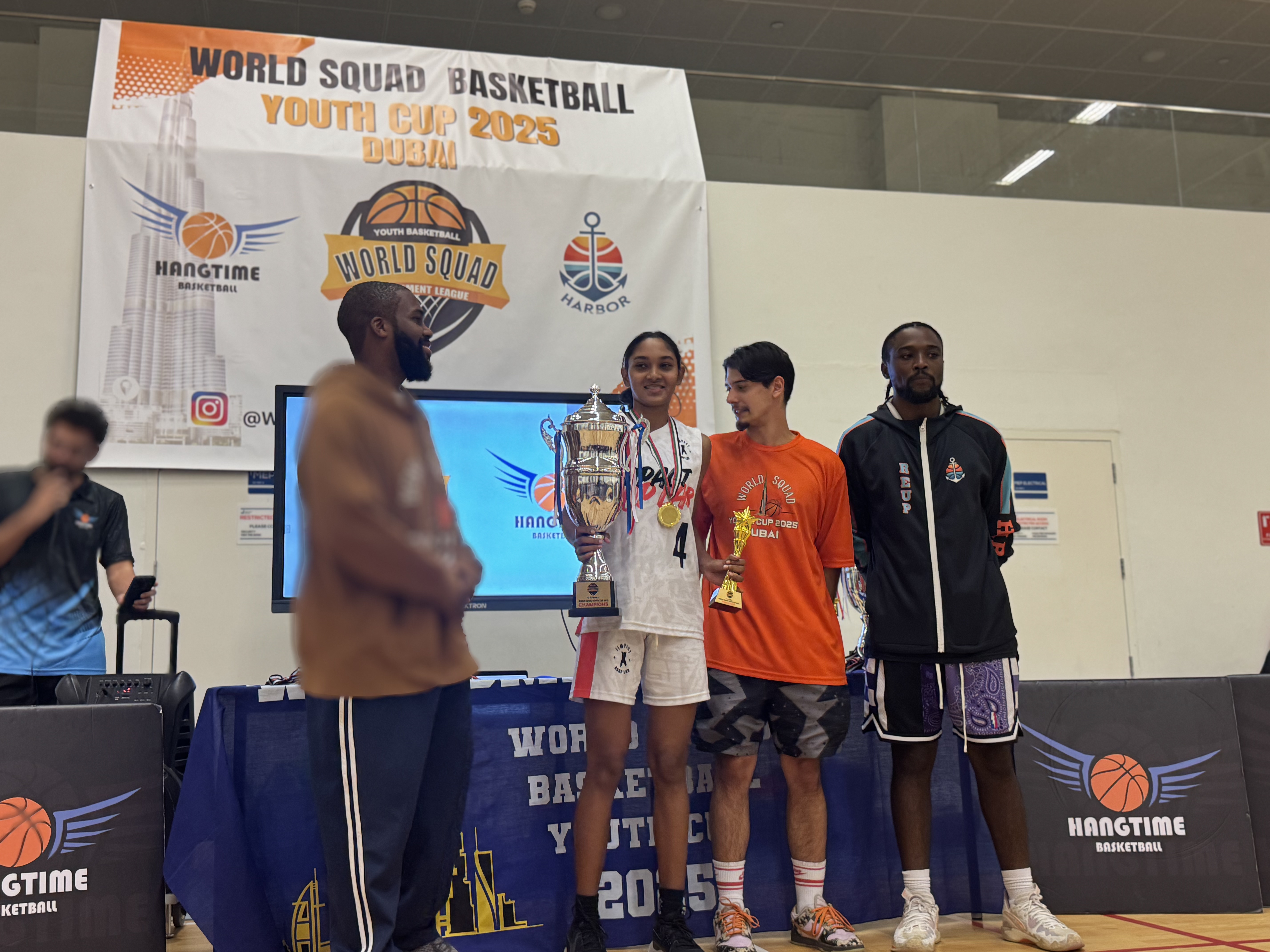 Girl player with trophy